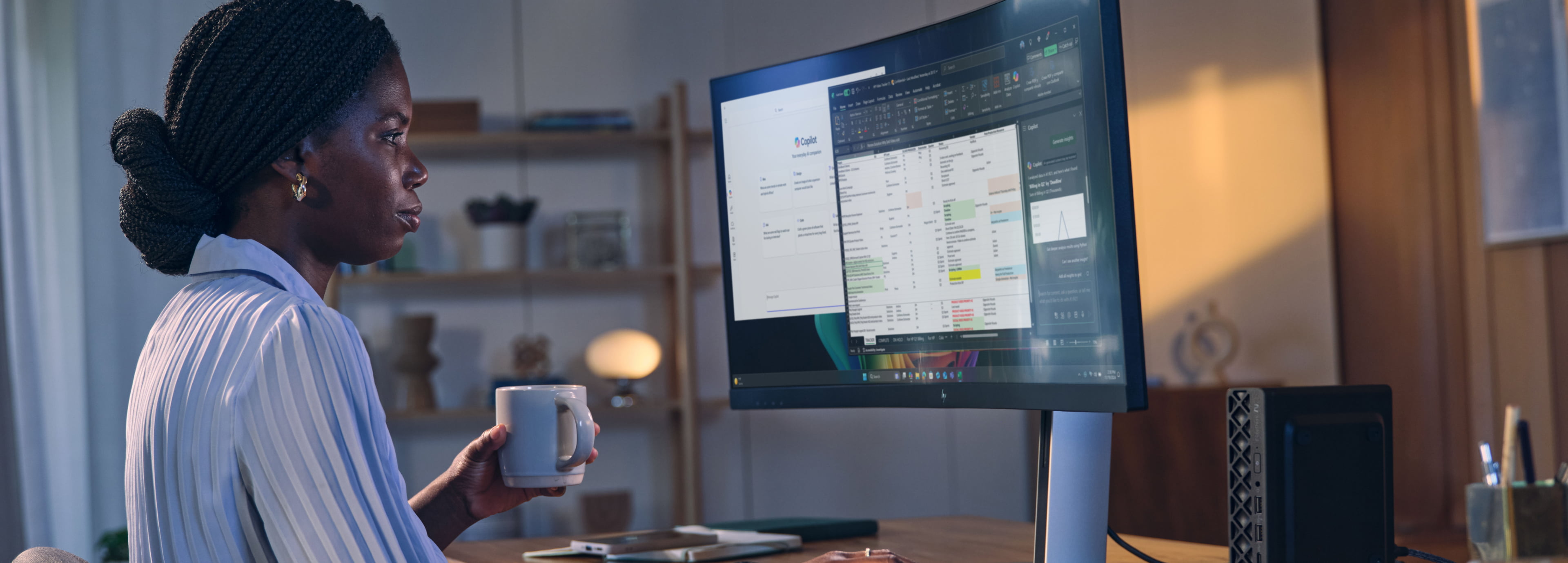 A woman working from home on an HP EliteDesk All-in-One