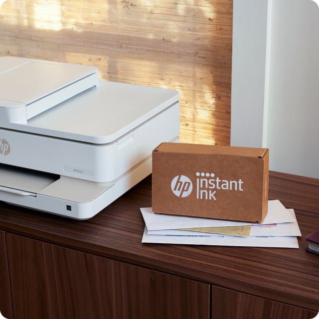 HP Envy with HP Instant Ink sitting on table