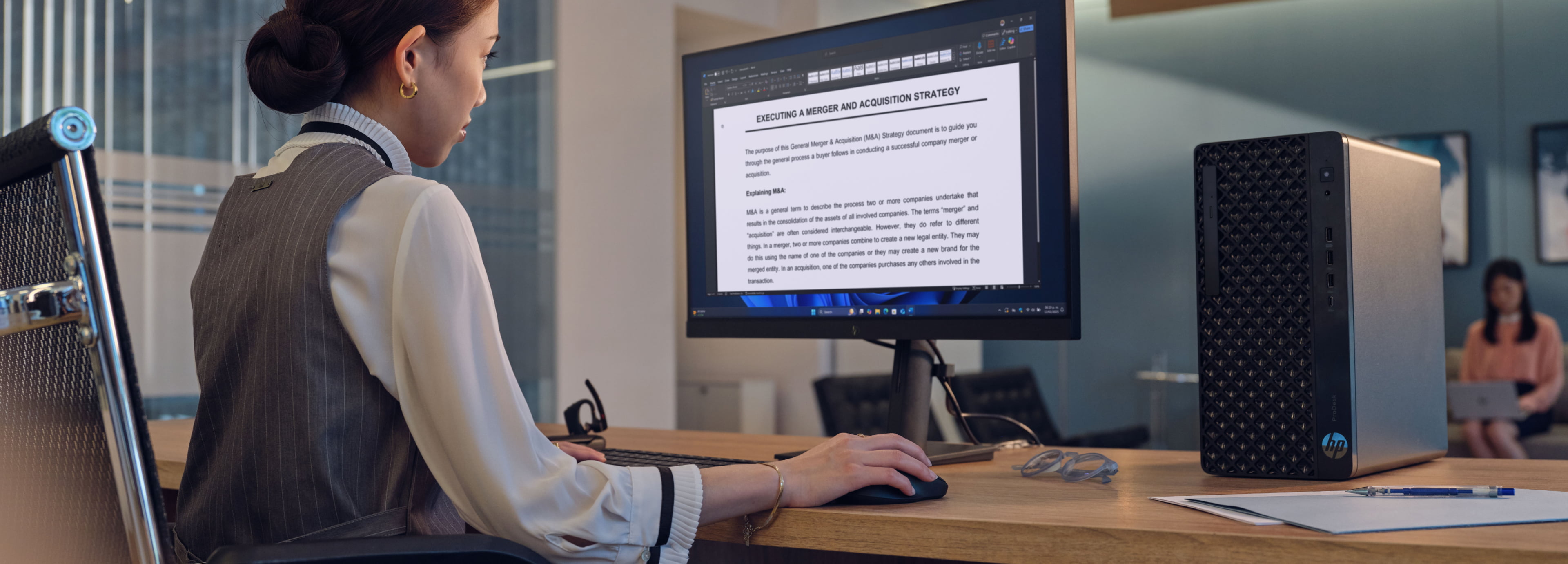 A woman working on her HP computer