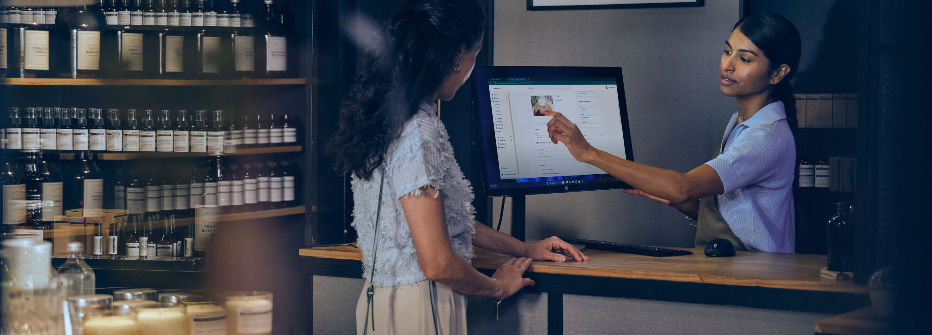 A man checking a product while sitting in front of his HP PC