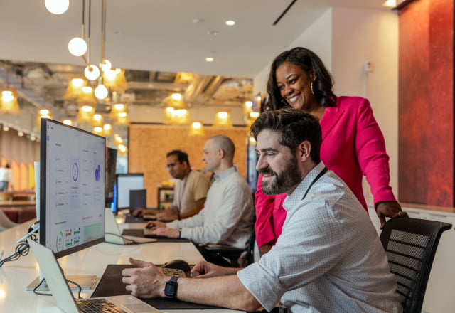 HP employees look at Workforce Experience Platform