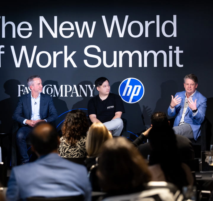 Fast Company panelists on a speaking event stage