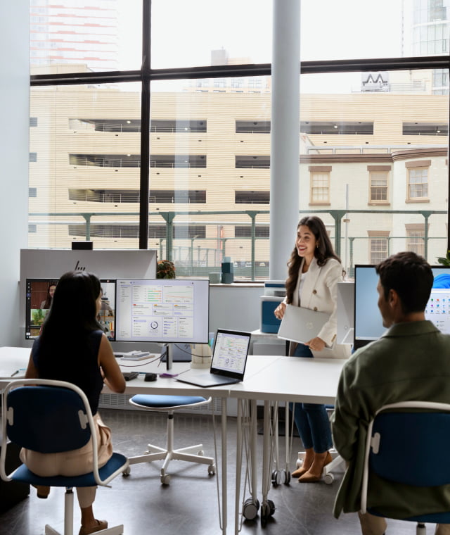 Team working together at desk in office