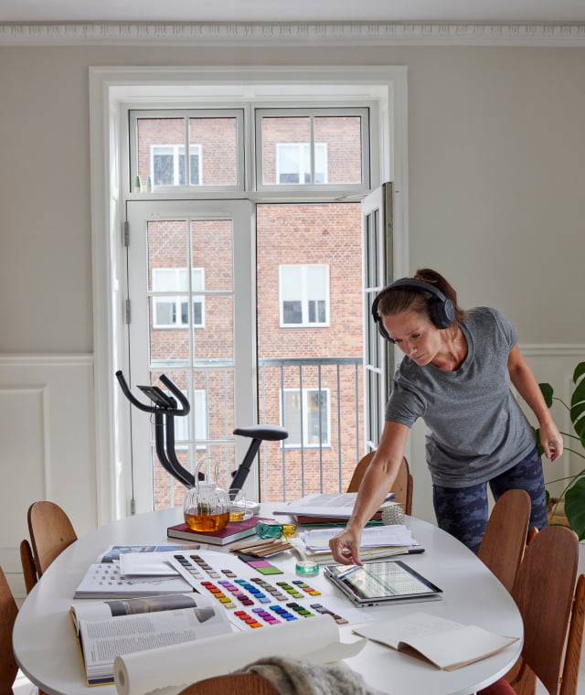 Woman doing creative work in home office