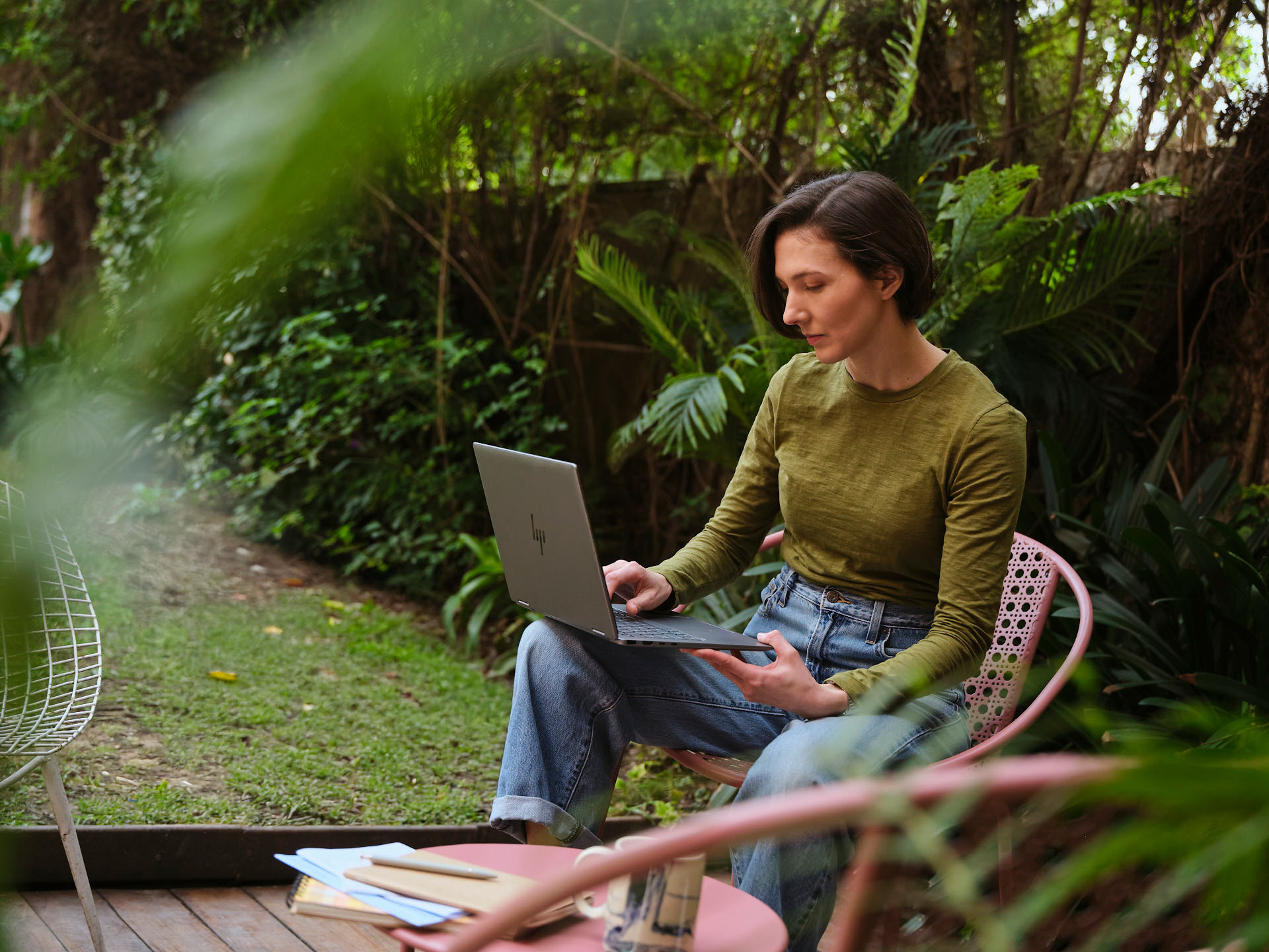 A woman in front of a computer