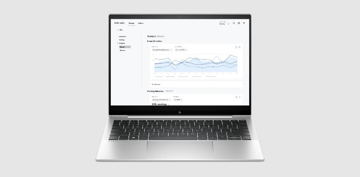 Open laptop showing Poly Lens software UI onscreen