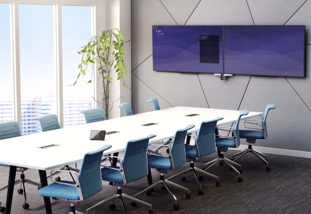 Empty meeting room displaying Poly products for spaces