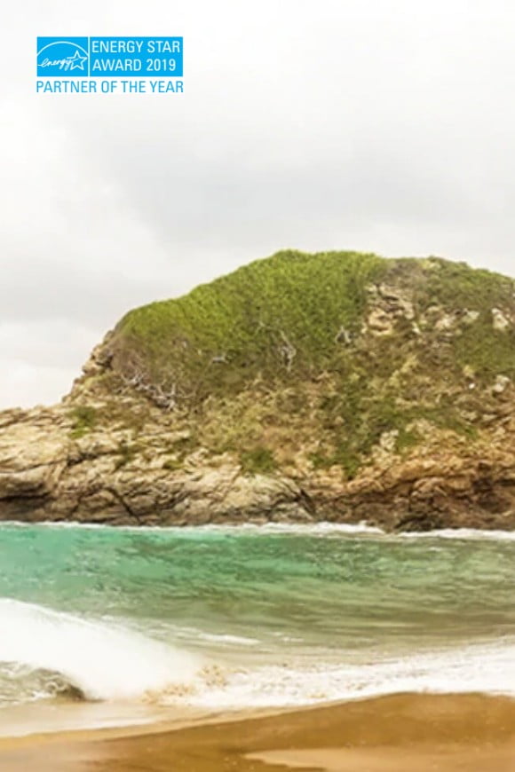 A beach landscape image with the Energy Star Award 2019 - Partner of the year logo 