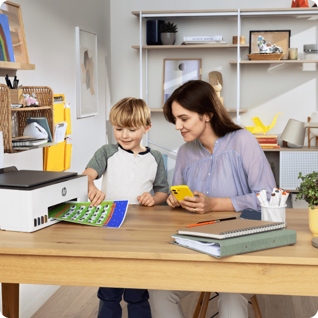 Child and mother printing craft images