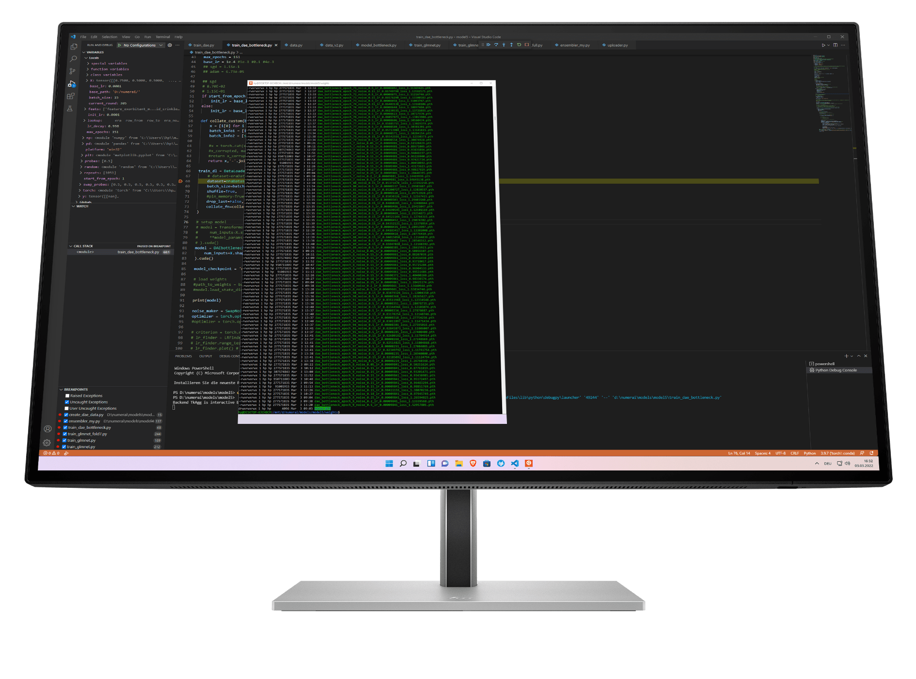 HP monitor display with development software interface.