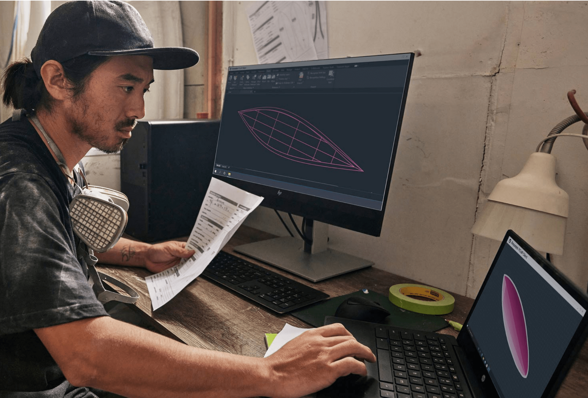 Engineer working on desktop computer